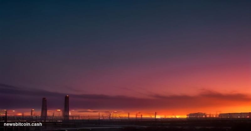 A dramatic cinematic photorealistic editorial photograph taken at ground level inside a sprawling oil refinery complex at dus